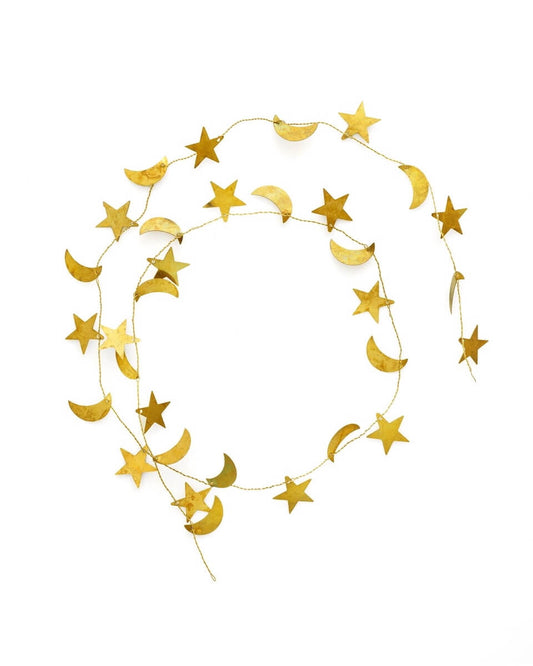 Gold star and moon garland on a white background