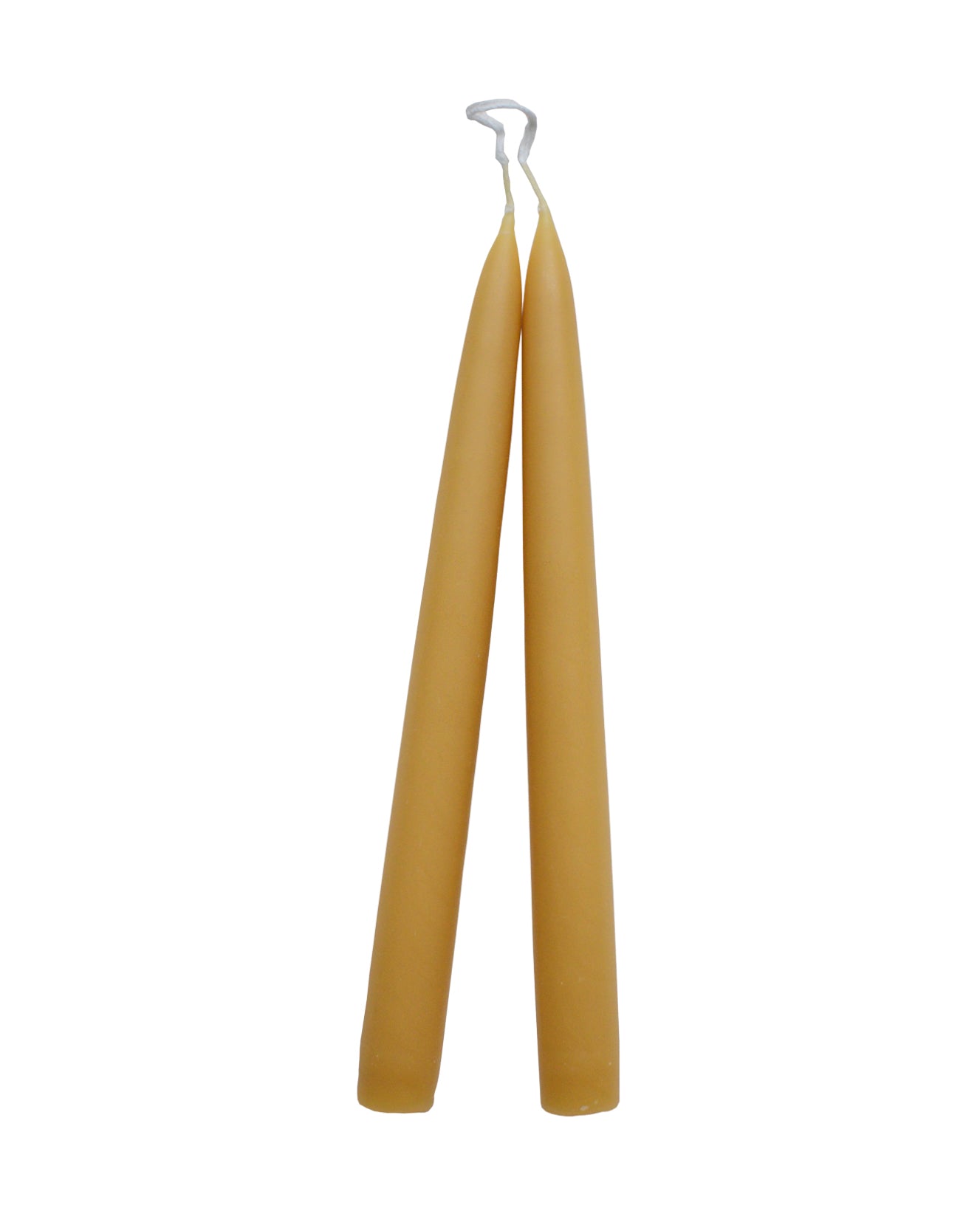 A pair of pure beeswax dinner candles, on a white background.