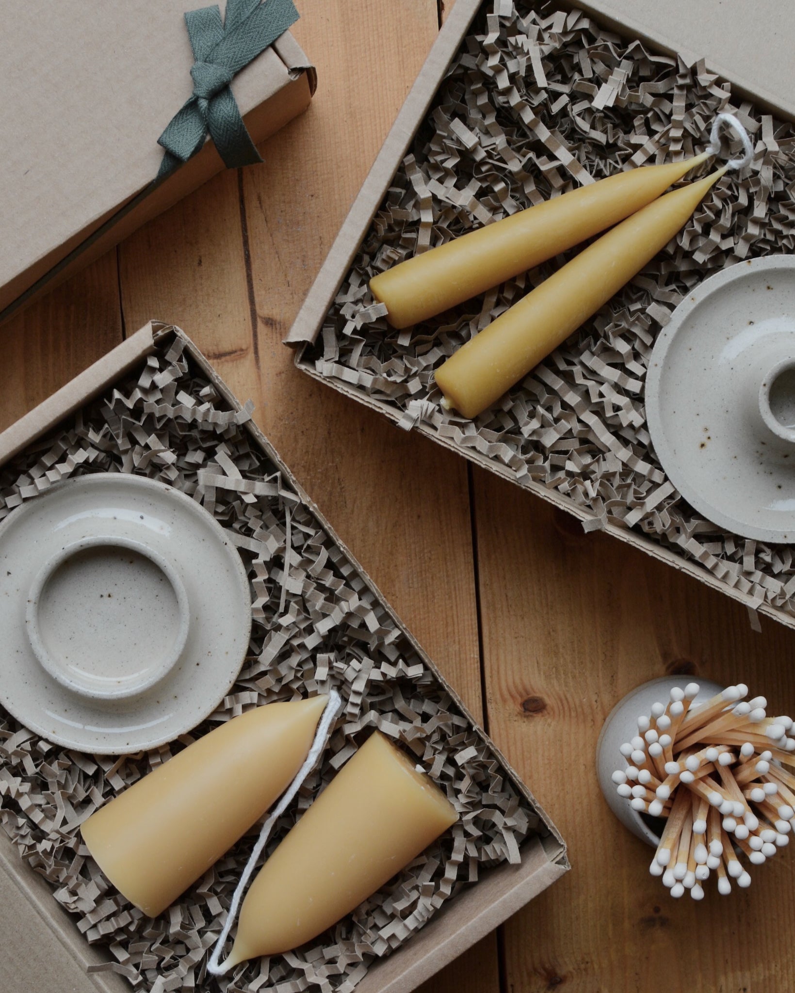 Pure beeswax candles, in gift boxes with ceramic candle holders.