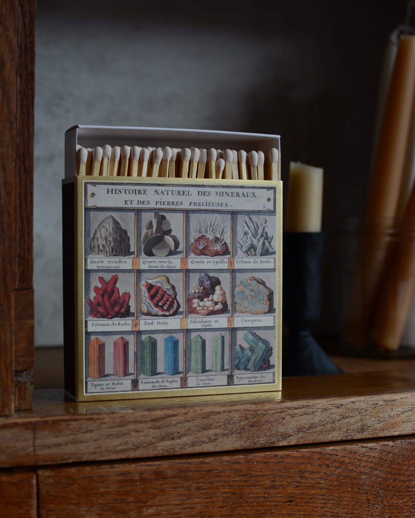 Match box with an illustration of minerals.