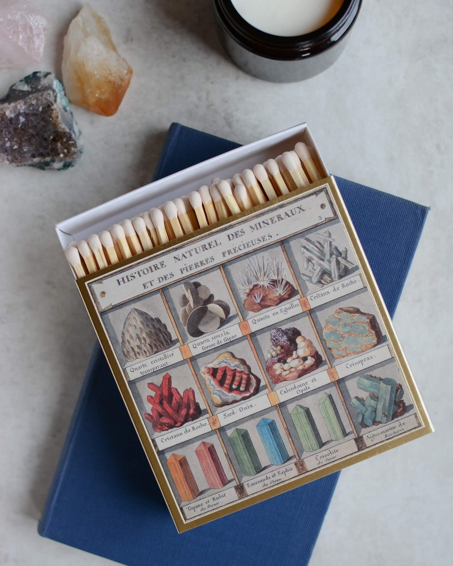 Match box with an illustration of minerals.