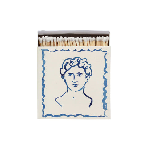 Blue and white square matchbox.