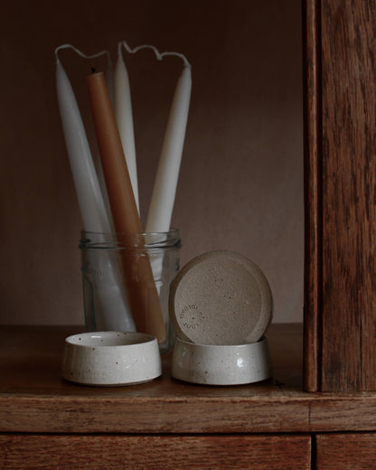 A collection of ceramic tea light holders.