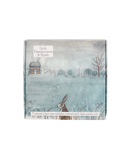 Gold, Frankincense & Myrrh tea lights with a winter scene illustration on a white background