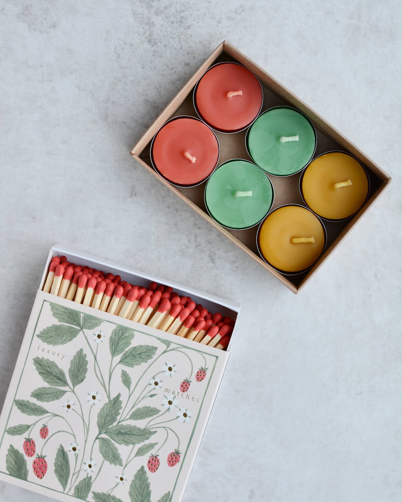 Colourful beeswax tealights in Spring colours.
