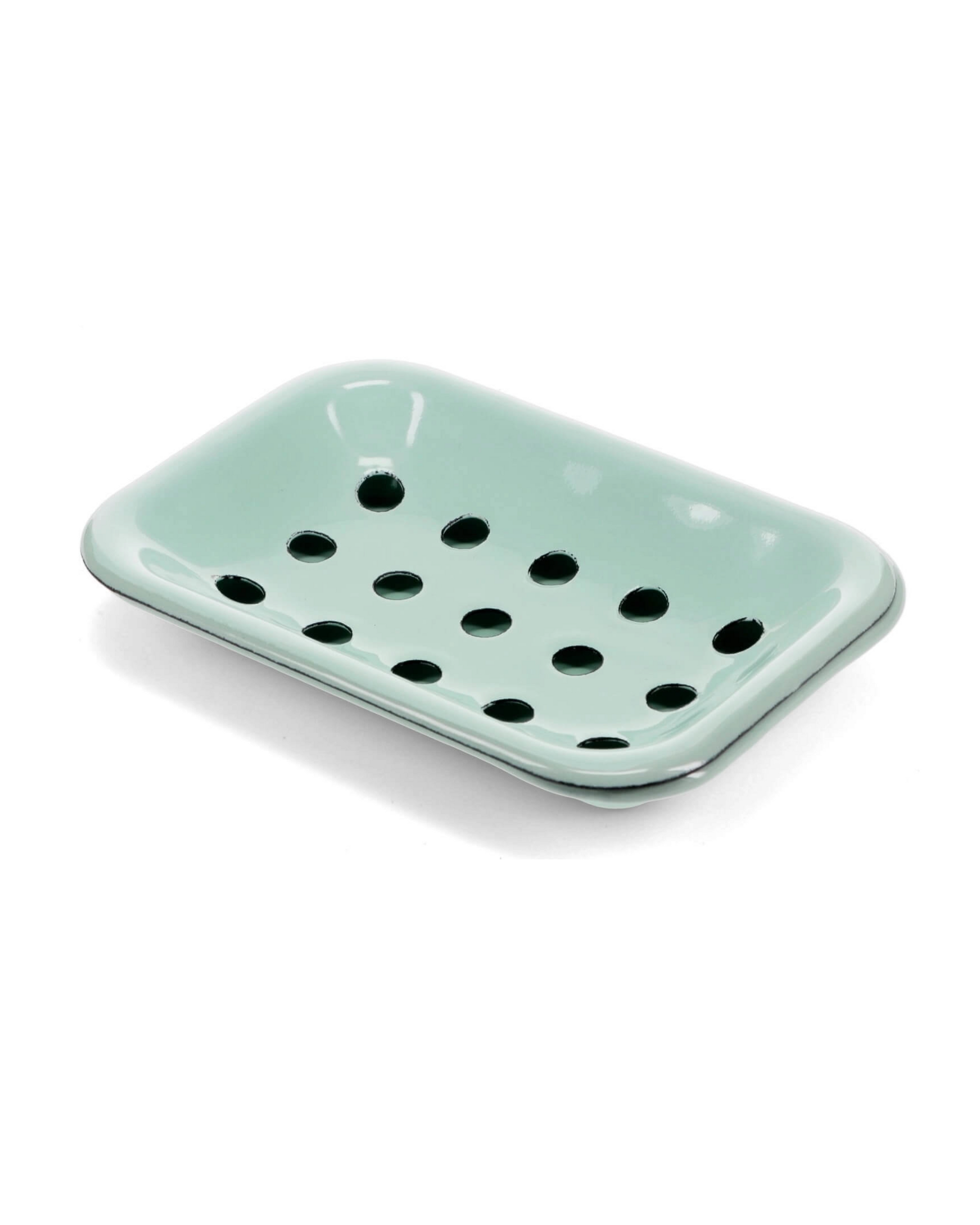 Mint green soap dish with drainage holes, on a white background