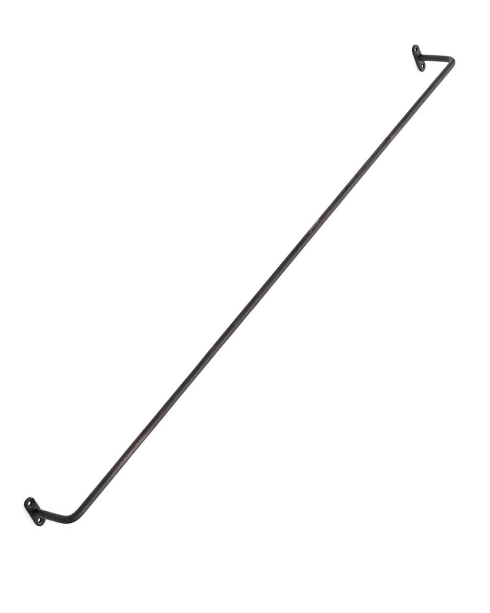 A black iron wall-mounted hanging rail.