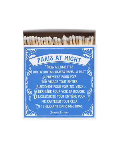 Blue and white matchbox, with a poem entitled 'Paris at Night'.