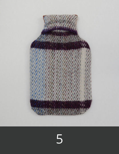 Wool hot water bottle cover with aubergine, pale grey and ark grey pattern.
