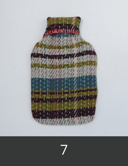 Recycled wool hot water bottle cover with turquoise, green and white stripes.