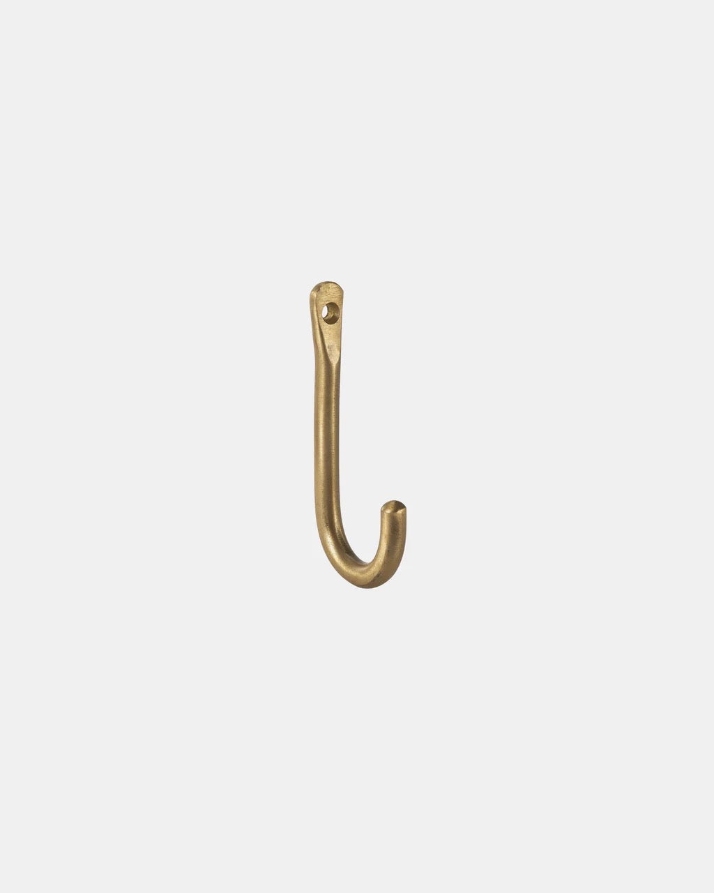 Brass wall hook on a white background