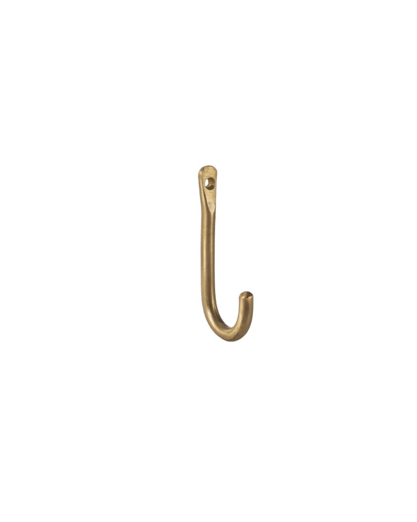 Brass wall hook on a white background