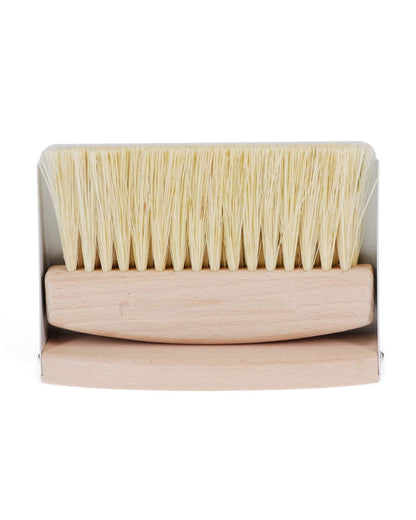 A wooden table brush and pan set, on a white background.