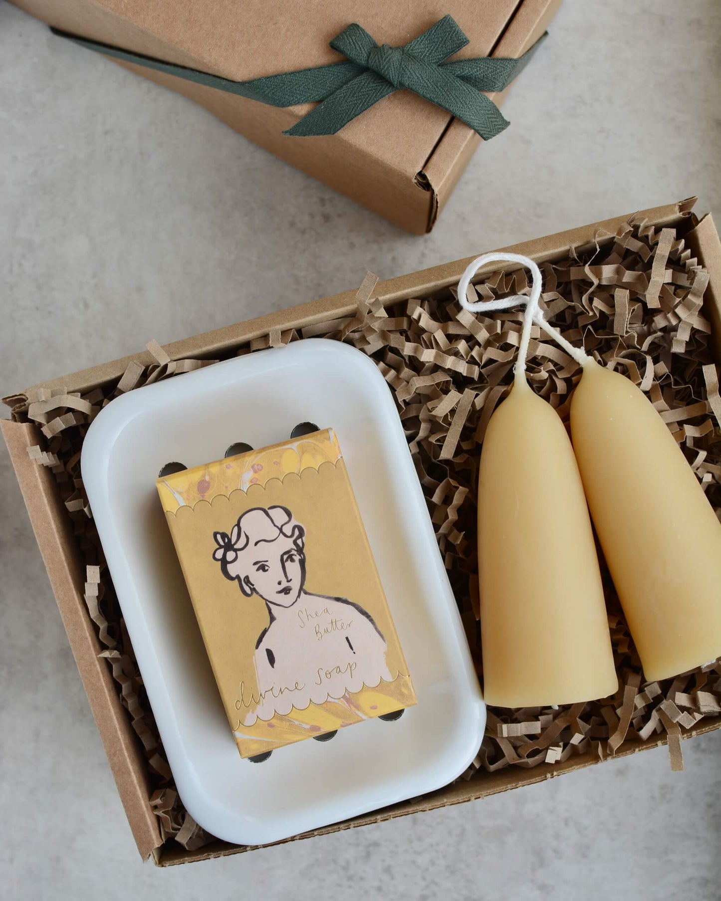 Gift set with beeswax candles, soap, and a white enamel soap dish.