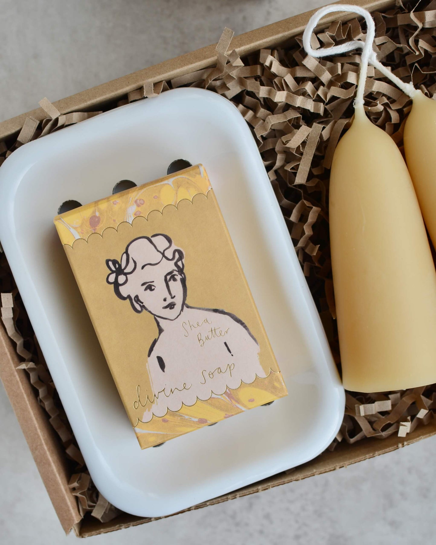 Gift set with beeswax candles, soap, and a white enamel soap dish.