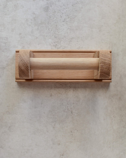 Wall-mounted solid oak toilet roll holder, with shaker detailing