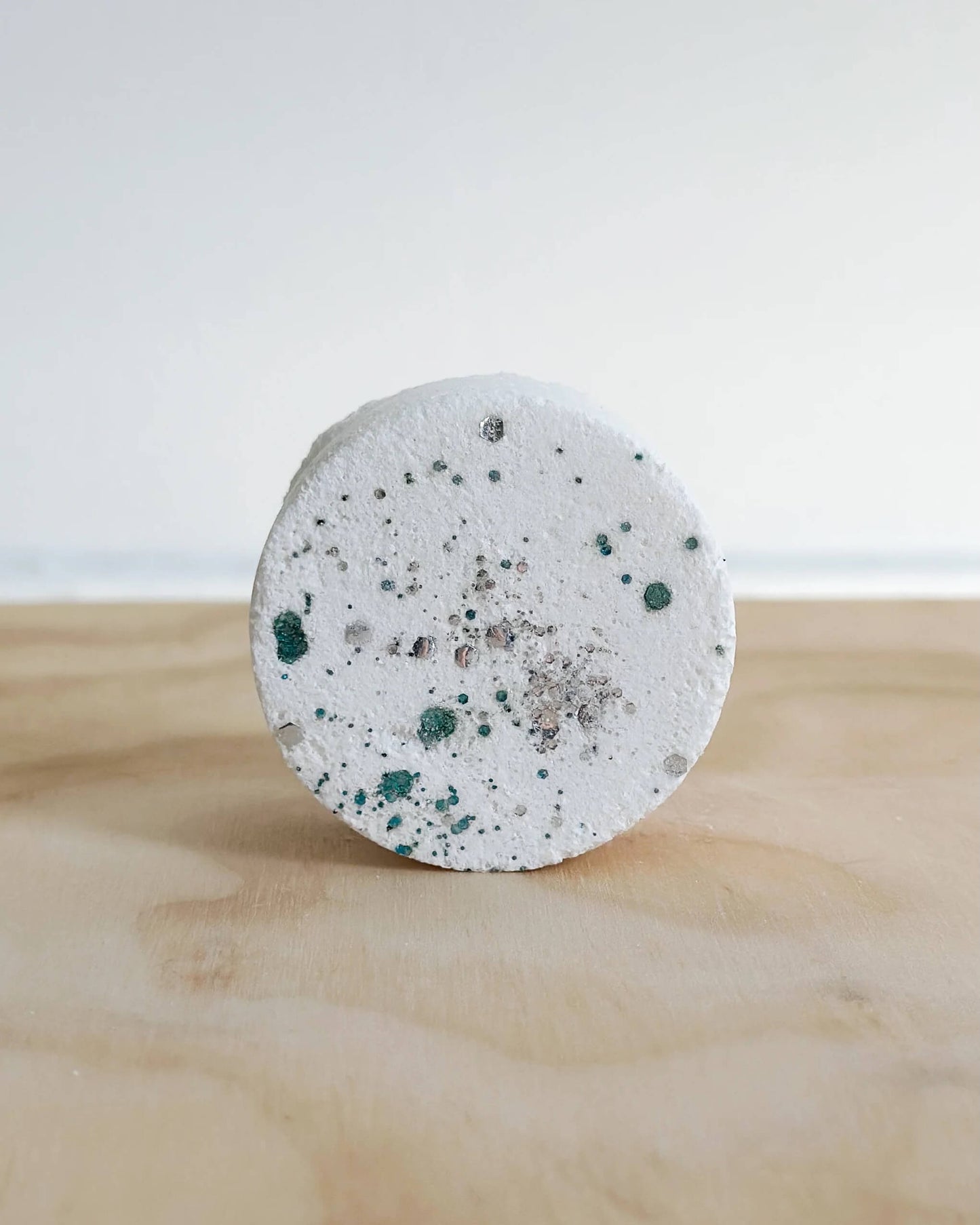 Handmade Winter Shower Steamer with juniperberry, spruce, and cedarwood essential oils.