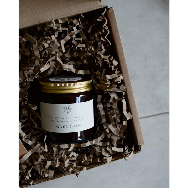 Green fig scented soy candle by The Botanical Candle Co. Gift box.